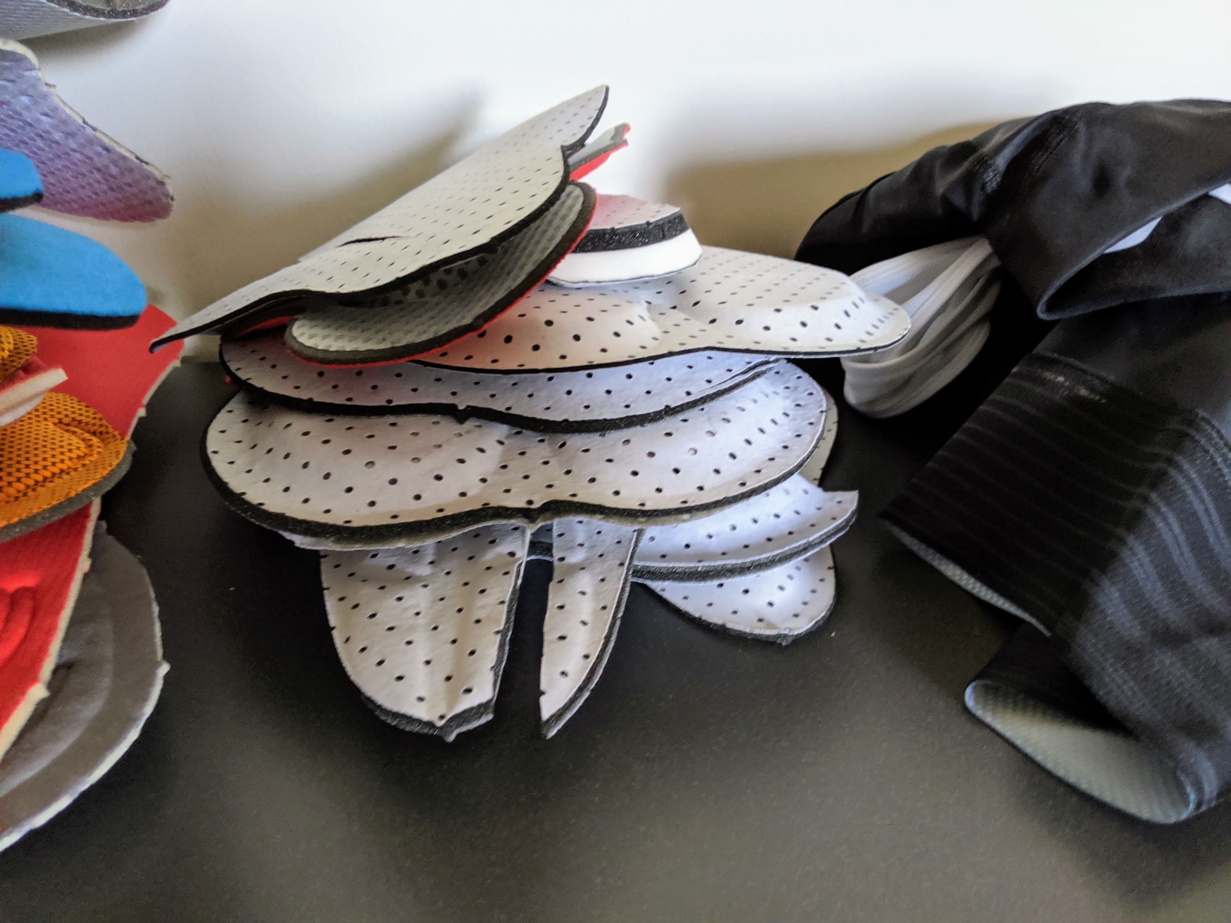 A stack of chamois prototype iterations